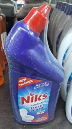 Niks Toilet Cleaner 1 Ltr added Ultra Cleaning technique with No acidic odor. Makes White pot and Last long then ordinary Toilet Cleaners.